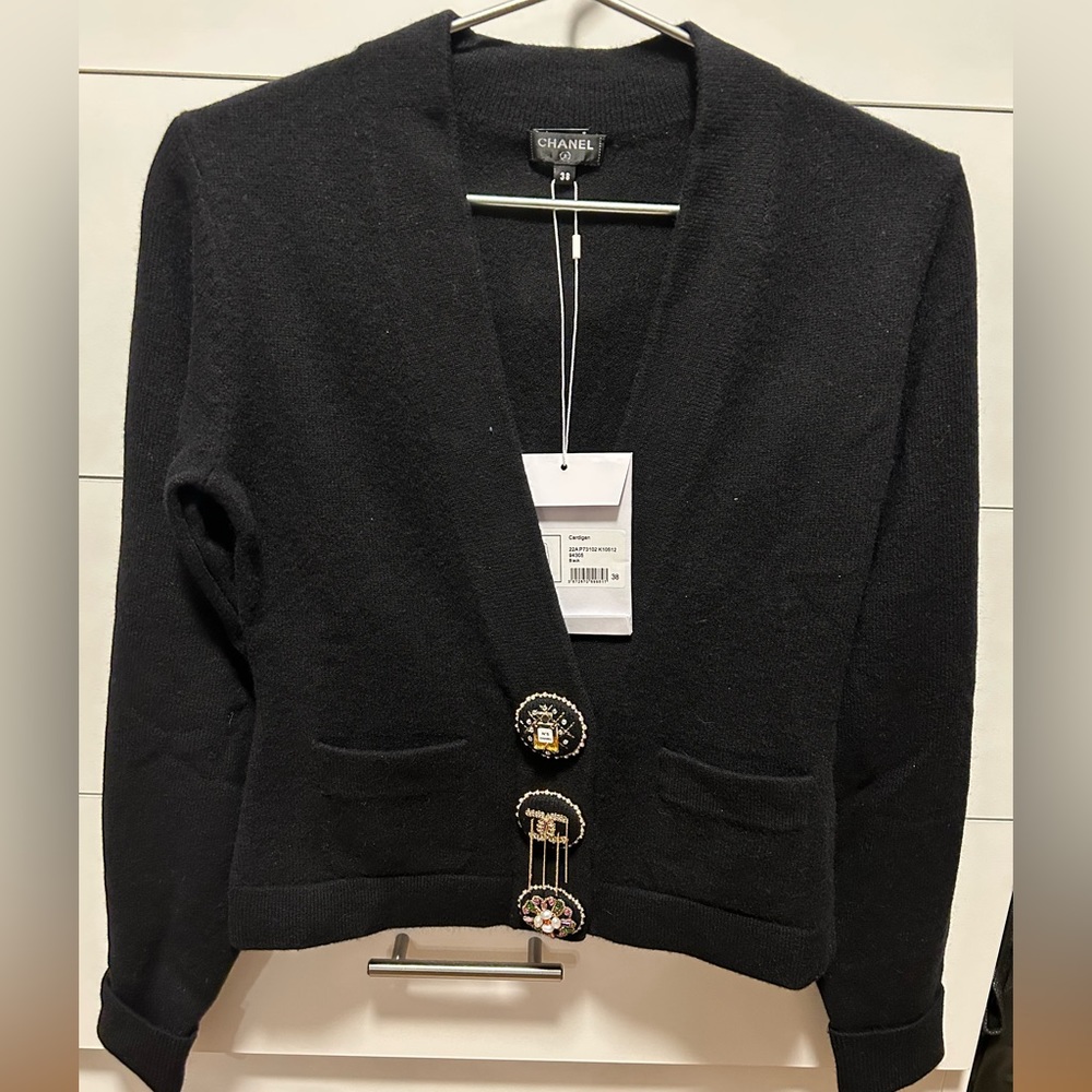 Chanel Cashmere Sweater with Embellished Closures.